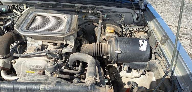 NISSAN KING CAB (D22) 2.5 TDi PICKUP DOUBLE CABINE 133CV – DIESEL – 110975 KMS GRIS CT-736-HD